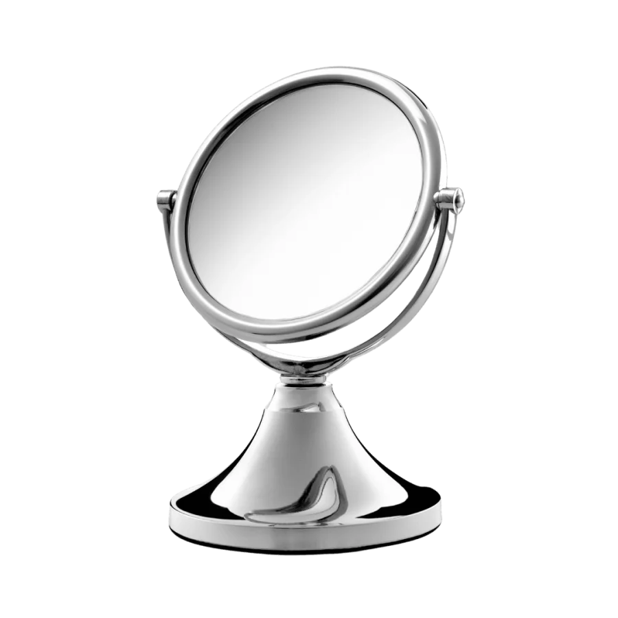 Espelho de aumento para cuidados faciais dupla-face com Ø115mm, sendo uma plana e outra com ponto focal de 30cm. Possui base para mesa e rotaciona no eixo vertical.